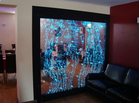 H2o designs bubbling wall at the Manzil Restaurant with colour changing lighting.